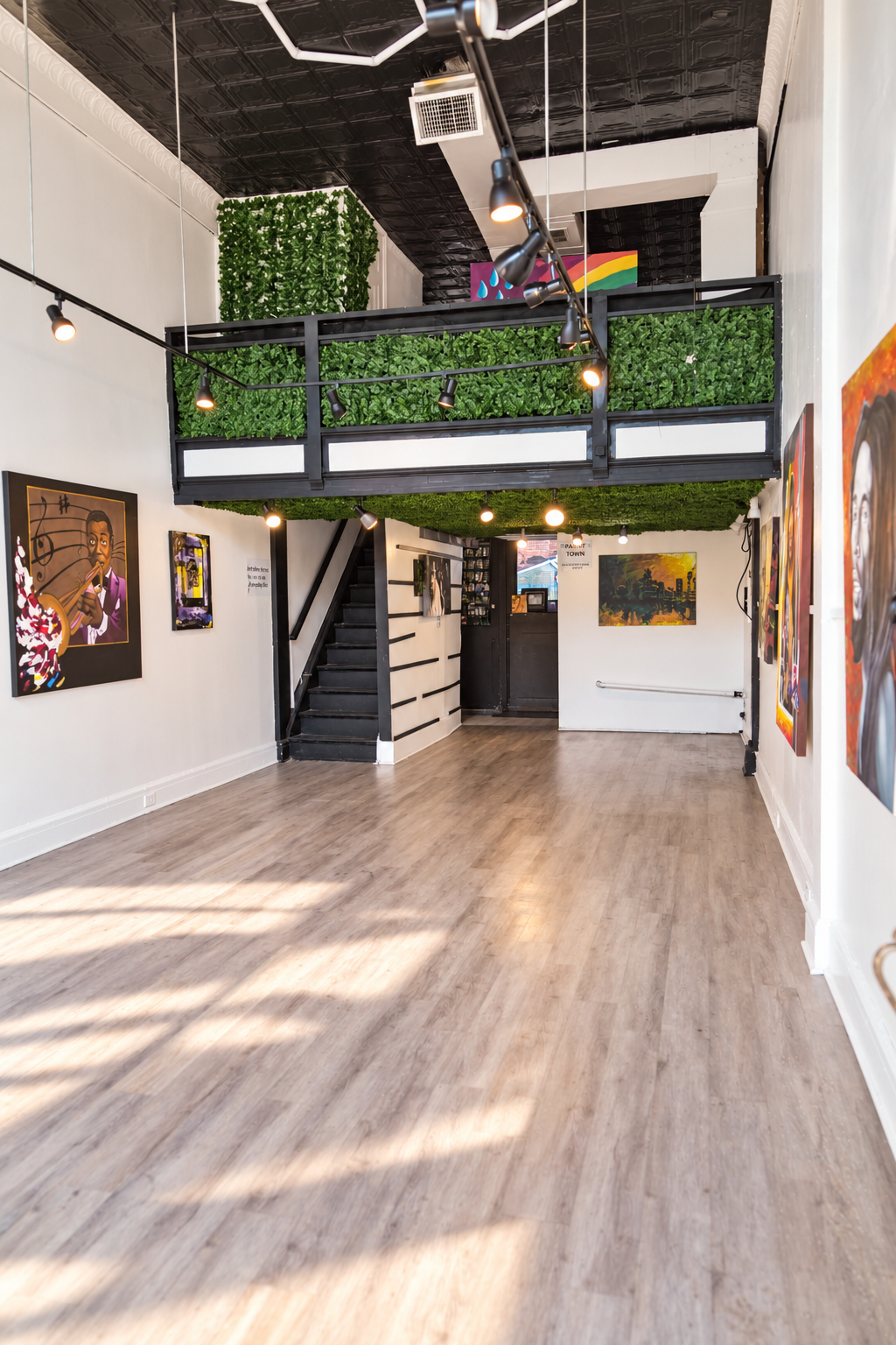 Gallery view toward the upstairs creative space