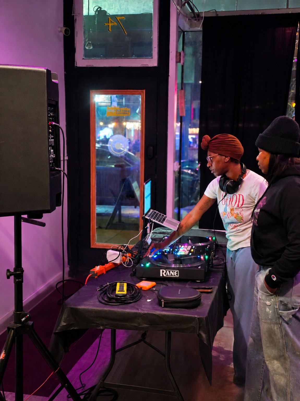 DJ using audio equipment at the creative space